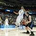 Michigan sophomore Trey Burke jumps to block a shot and fouls South Dakota State senior Nate Wolters on Thursday, March 21. Daniel Brenner I AnnArbor.com